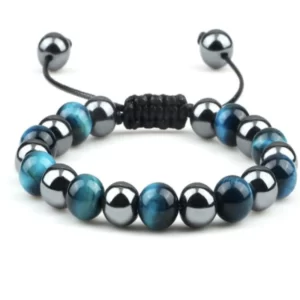 An image showcasing an adjustable bracelet with alternating beads of Blue Tiger's Eye and Hematite. The Blue Tiger's Eye beads have bands of luminous blue and black, while the Hematite beads exhibit a polished, metallic sheen. The bracelet is designed with a black, macramé-style sliding closure for adjustable sizing.